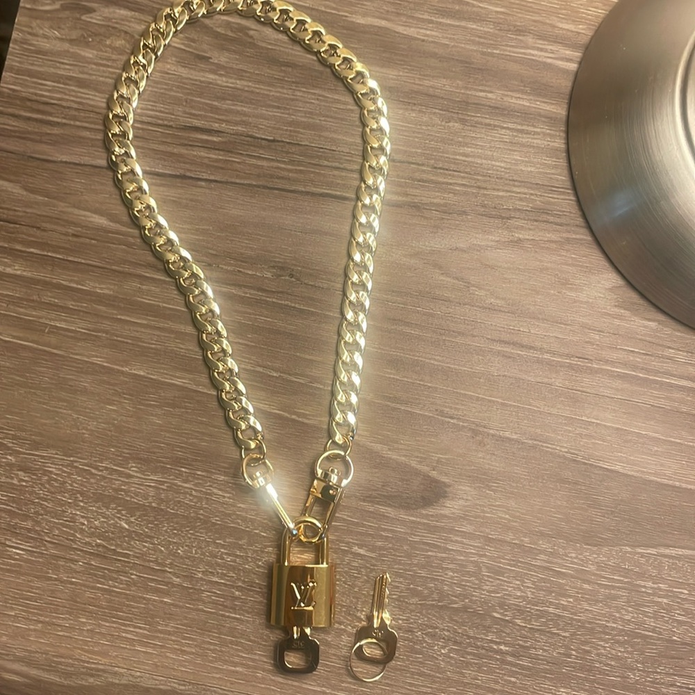 Brand new LV lock and key #315 with a chain necklace